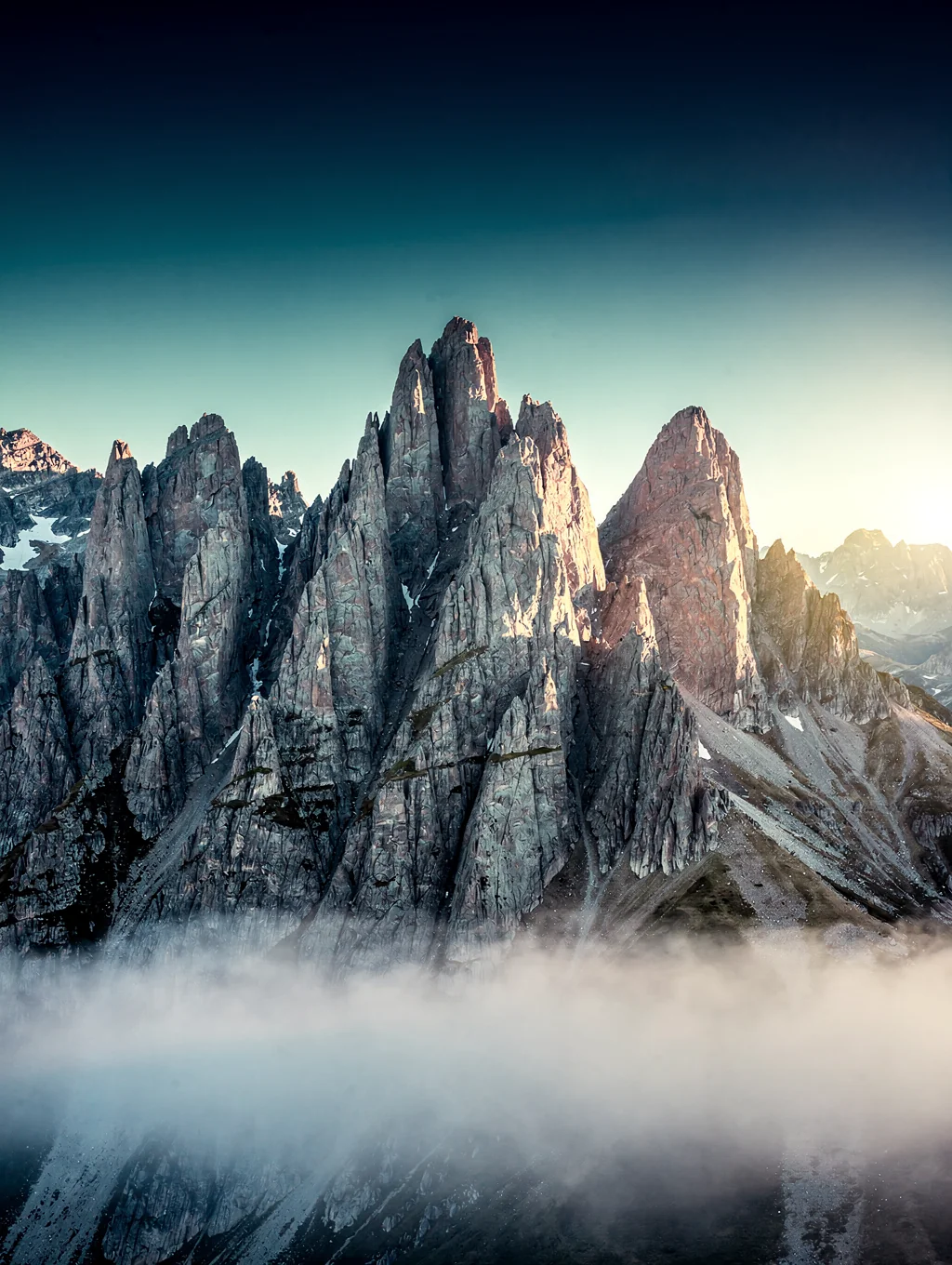 Jagged granite peaks catching the first golden light